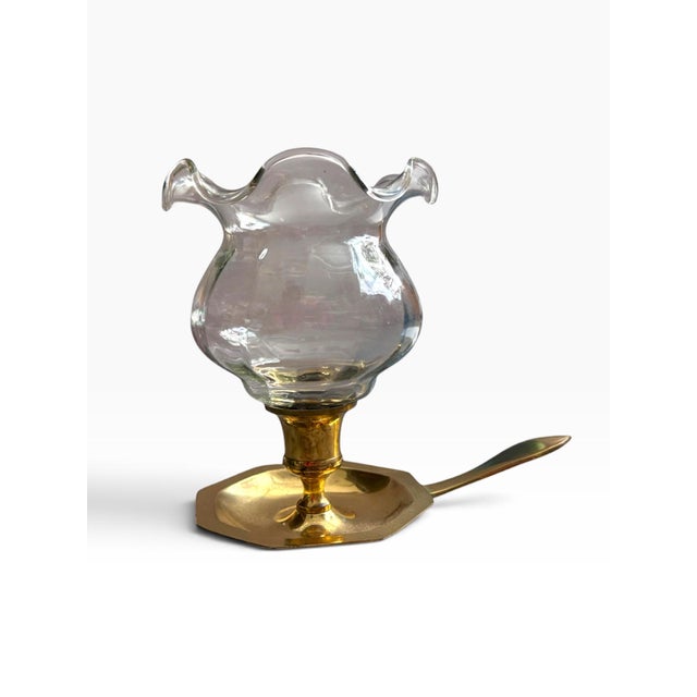 Elegant vintage brass chamberstick candle holder featuring a removable clear glass hurricane shade with a beautifully...