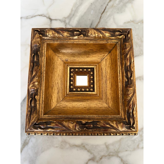 Fantastic Italian Petite Mirror of Gold Leaf over Wood. Charming tiny mirror of approximately 1” square is centered within...