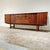 Beautiful large 1960s design sideboard, made of rosewood veneer, by Fristho Franeker. The sideboard has sliding doors on...