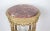 A taller side table in the classicist style of Louis XVI. The table is made of solid wood, hand-carved and turned, the...