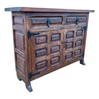 1940s Spanish Rustic Carved Solid Wood Sideboard with Wrought Iron Details For Sale