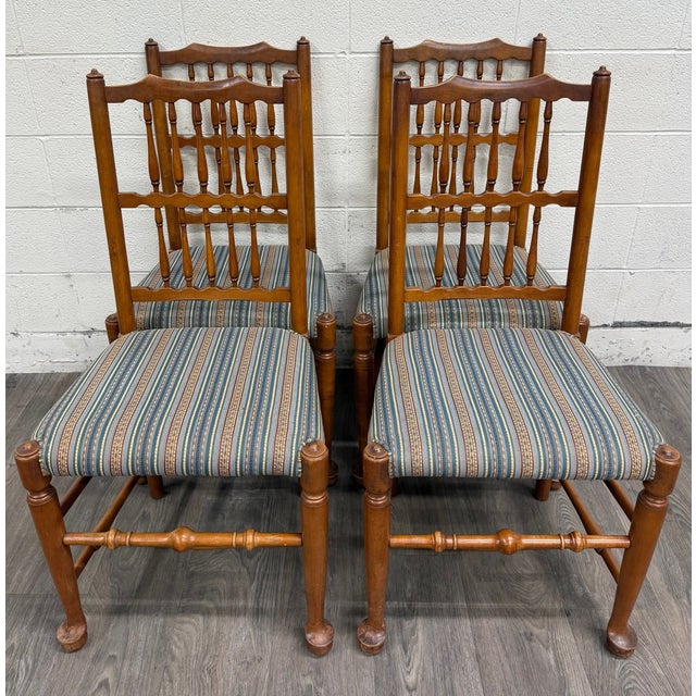 This is a beautiful full set of four vintage Colonial style dining chairs believed to be from the Stickley Fayetteville...