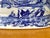 A beautiful blue and white porcelain foot bath featuring a nautical ship motif and handles on each end. Circa 1980s. Most...