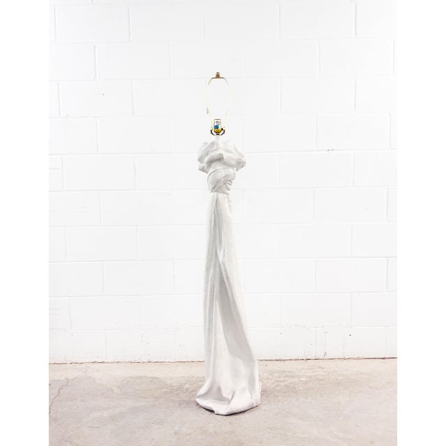 This sculptural floor lamp is a stunning tribute to the iconic "trompe l'oeil" (fool the eye) designs of San Francisco...