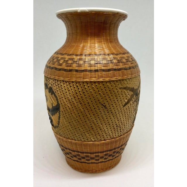A long lost art, these woven covered vases in perfect condition are hard to come by. For the panda lover or a gift to...