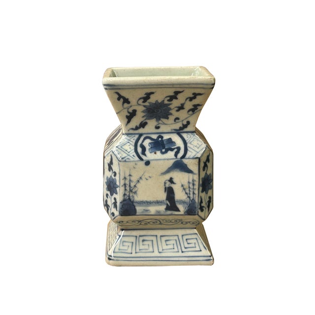 This exquisite antique Chinese blue and white ceramic vase jar is finely rendered in an unusual faceted, baluster-inspired...