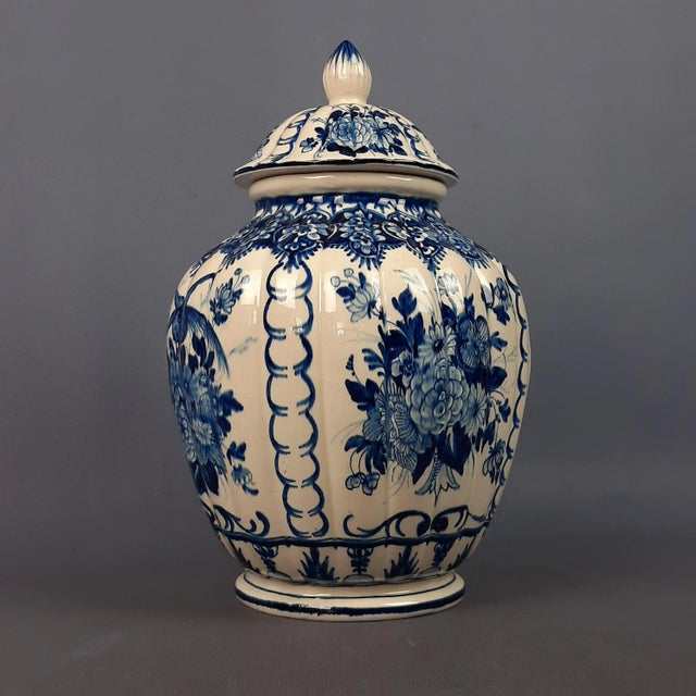 Beautiful vintage ceramic potiche, vase with lid with ribbed design with floral theme, made and signed Nove Italie,...