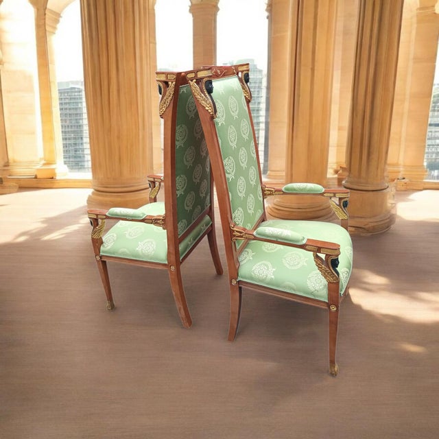 Experience the height of 19th-century elegance with this exquisite ser of French Empire style chairs. Masterfully crafted...