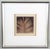 Art Glass Palm leaf. Framed behind glass. A decorative art glass work depicting a palm leaf. The piece highlights the...