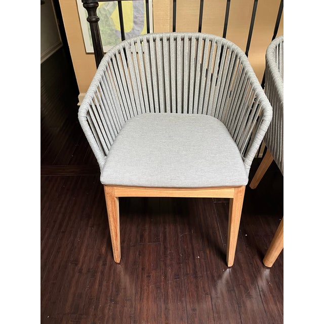 This is a pair of authentic Mood Dining Armchairs, designed by the acclaimed Studio Segers for the luxury Belgian outdoor...