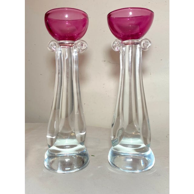 Up for sale is a high quality pair of hand blown Italian Murano glass candlesticks by Alfredo Barbini. They are blown out...