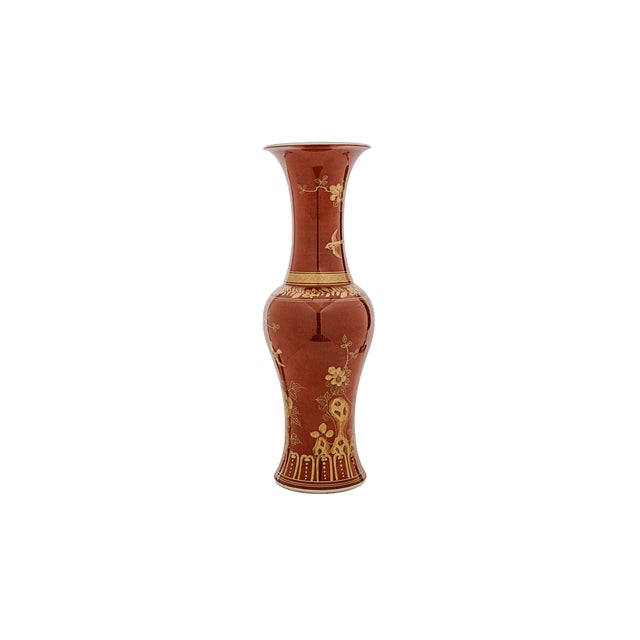 Antique Chinese Coral-Ground Gilt-Decorated Porcelain Vase. This traditional form of Asian decorative art features a...