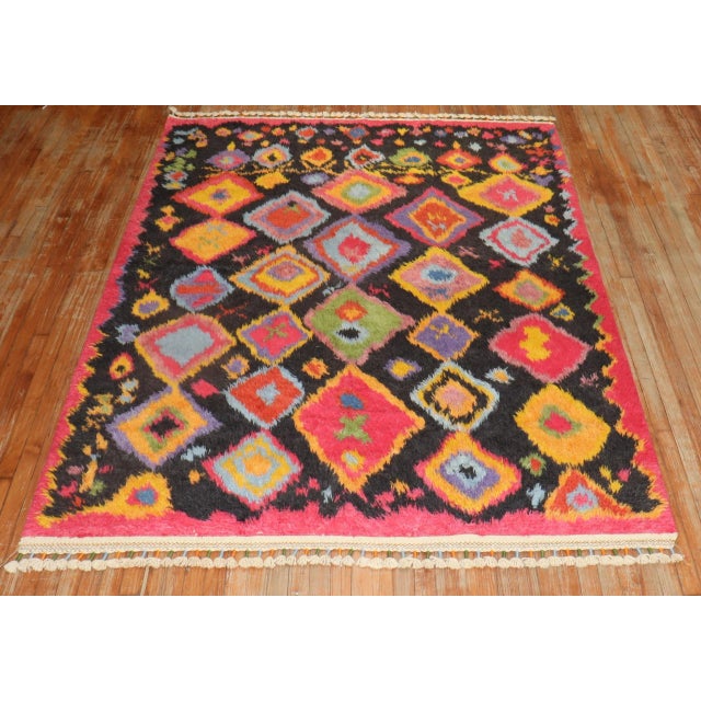 one of a kind 3rd quarter of the 20th Century dazzling wool on cotton intermediate square size rug.