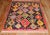 one of a kind 3rd quarter of the 20th Century dazzling wool on cotton intermediate square size rug.