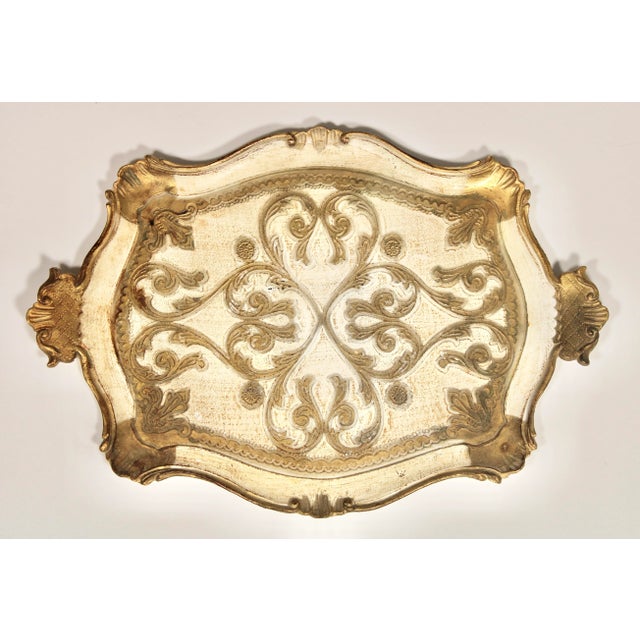 A stunning mid 20th century Italian Florentine Gold Gilded Tray with a lovely cream background. Excellent design and...