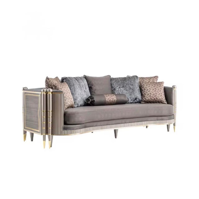 A dramatic statement sofa designed for luxury interiors, boutique lounges, and refined living spaces. This European-...
