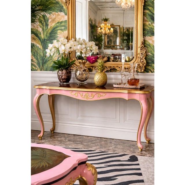 A statement in soft glamour and bold detail. This one-of-a-kind Rococo-style console table has been reimagined into a...