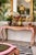 A statement in soft glamour and bold detail. This one-of-a-kind Rococo-style console table has been reimagined into a...