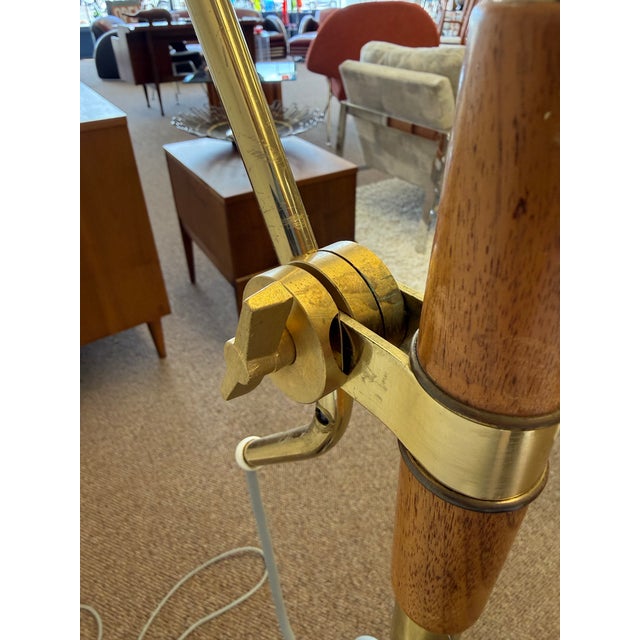 Rare mid century modern floor lamp designed by Gerald Thurston for Lightolier in the 1950’s. featuring an adjustable black...