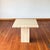 Vintage Post Modern Travertine Side Table by Stone International. Circa 1980s Features a minimalist design with a light...