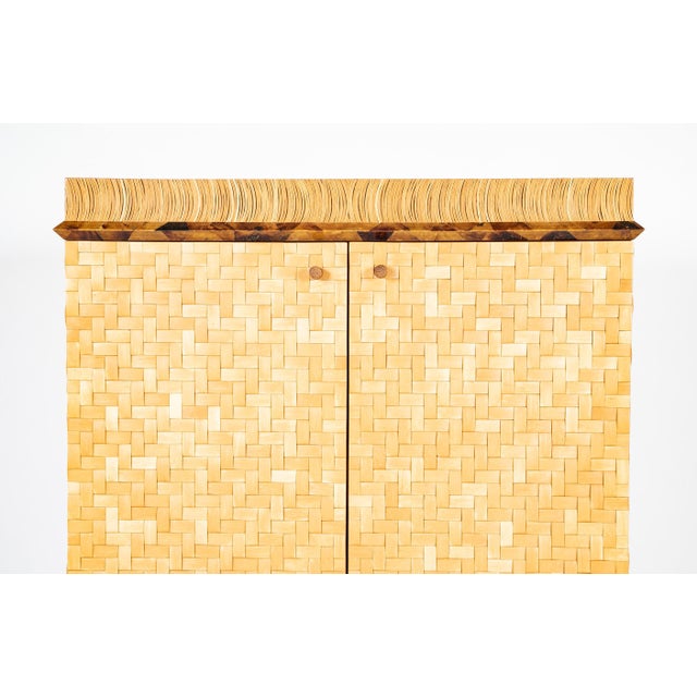 20th century lacquered bamboo, pen shell and eggshell cabinet Absolutely stunning two door cabinet made with a array of...