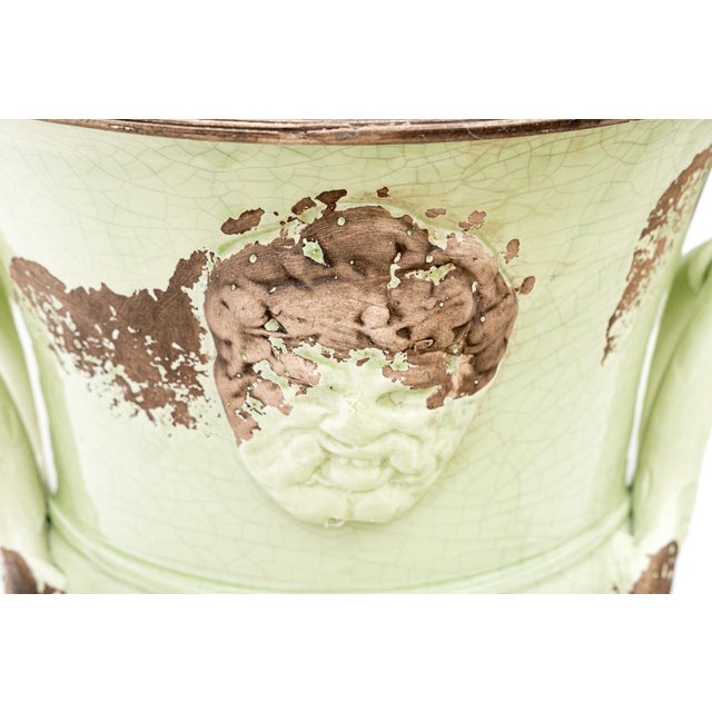 This striking mid-to-late 20th-century Italian ceramic urn is crafted in the classic Neoclassical style, beautifully...