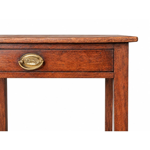 An early American Federal-period country worktable, with clean lines and classical symmetry, dating from approximately...