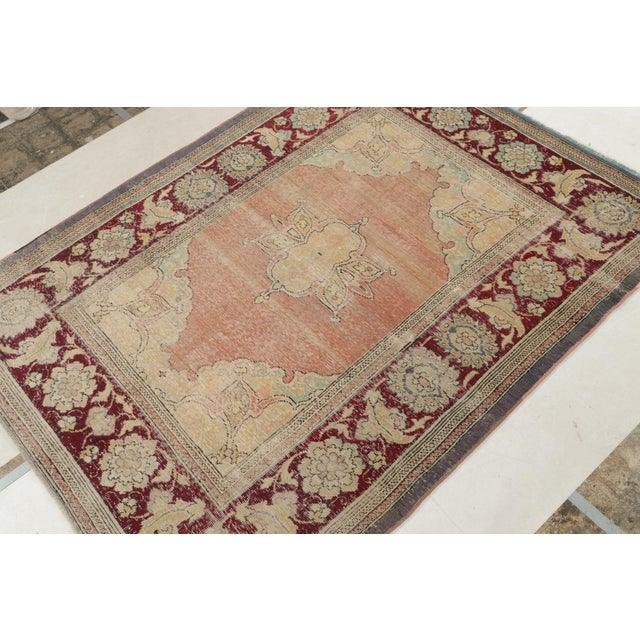 This antique 8x10 Hereke rug is a rare new selection in Rug & Kilim’s Antique & Vintage Collection—hand-knotted in wool...