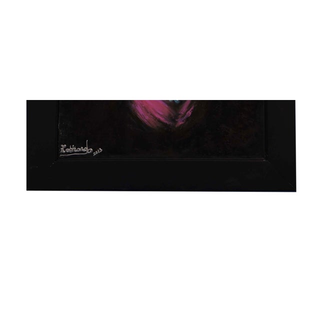 Glimmer of Bohemia is an engaging oil on canvas portrait by Lily Movahedi, measuring 25" x 33". The painting features a...