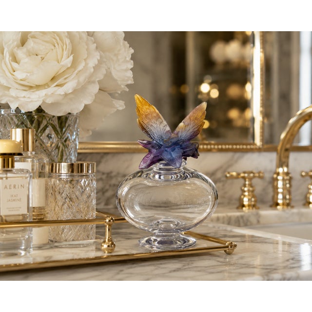 This authentic Daum France “Nature Papillon” crystal perfume bottle showcases one of the French crystal maker’s signature...