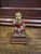 This 18th century polychromed wooden Santos depicts the Christ Child holding a sparrow in one hand. He is missing the...