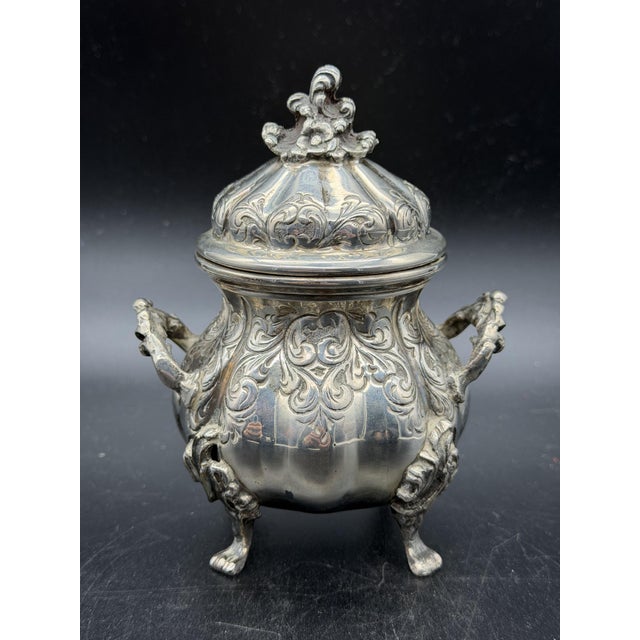 Antique 800 silver sugar bowl (330 g) with early 20th-century hallmarks. In Baroque style, it features a rounded body with...
