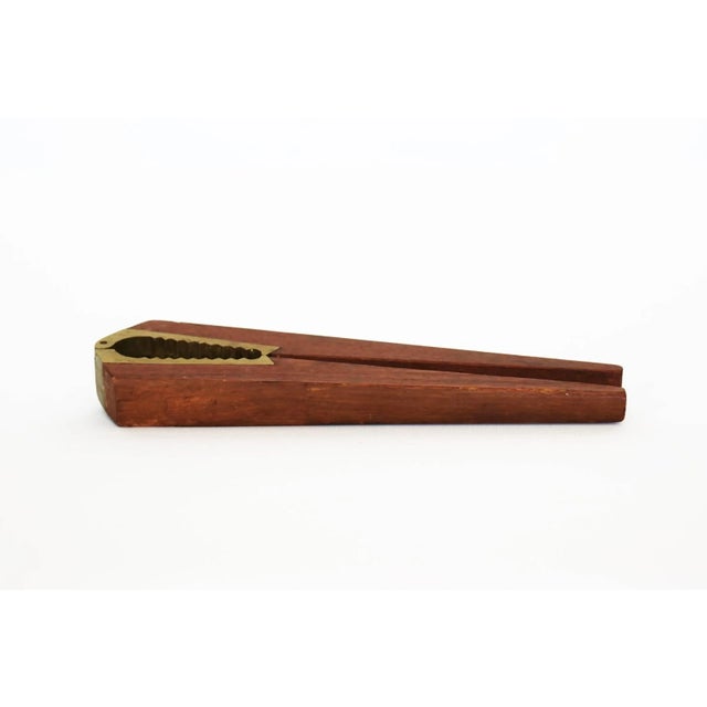 Brass and wood nut cracker.
