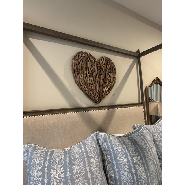 Handcrafted from reclaimed driftwood.