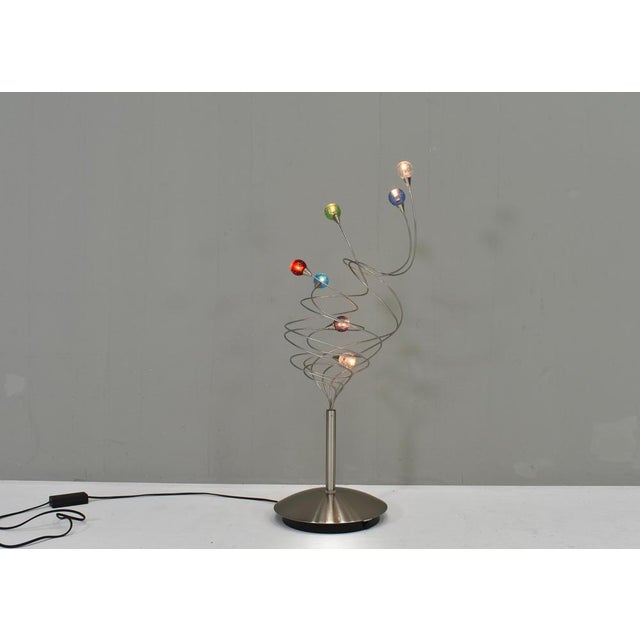 Iconic Strawberry table lamp by Harco Loor. The beautifully colored lamp shades are made of hand blown Murano glass....