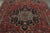 This approximate 7x11 antique Persian rug is a classic Karaje piece, hand-knotted in wool circa 1900-1919. Belonging to a...