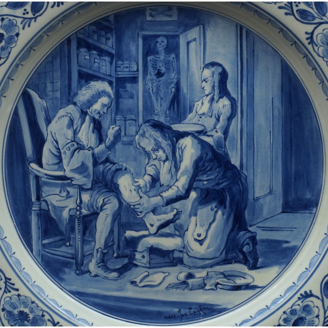 Very rare porceleyne fles/royal delft handpainted delft charger depicting a surgeon (chirurgijn) yearcode bk = 1941 (ww2...