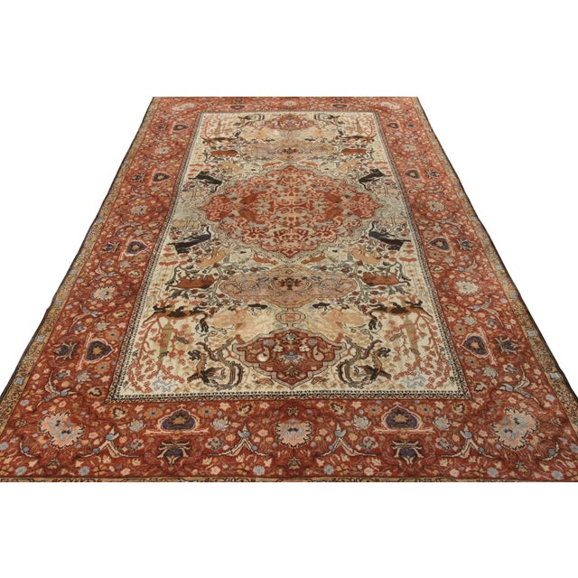 Hand knotted in fine quality wool, an antique 8x13 ode to the Tabriz Persian rug style originating circa 1920-1930....