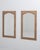 A pair of 19th century French wall mirrors in oak presented in a taller vertical format. The elongated proportions...