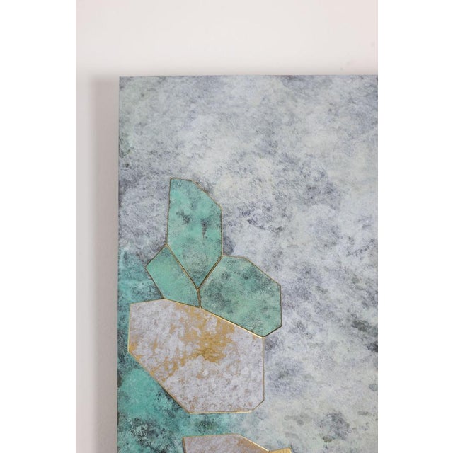 Decorative panel entitled “Fragmentations – VIII” in inlaid and oxidized brass. Glossy varnish finish. Unique piece. This...