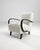 Introducing the 1950s Czech Wooden Armchair by J. Halabala, a timeless piece that combines vintage charm with modern...