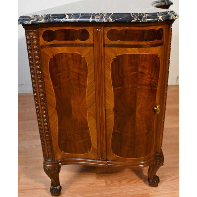 We are pleased to offer this beautiful Antique French Louis XVI Commode ,from the 1920. This commode is made of walnut...