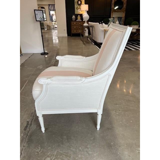 Elegantly designed with timeless French craftsmanship, this Custom French Armchair exudes sophistication and comfort....
