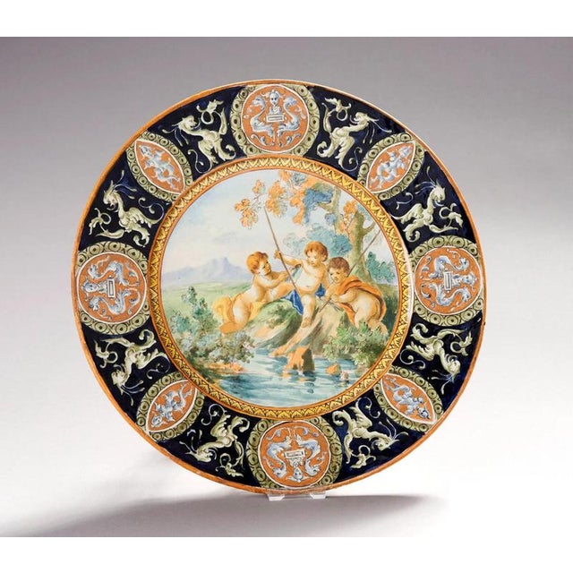 Beautiful Italian Urbino Ceramics Plate from the 19th Century Large round dish in polychrome earthenware from Urbino...