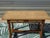 Antique, traditionally crafted solid oak desk, assembled with wooden dowels. This rustic-style desk features a beautiful...