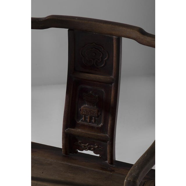 This fascinating Chinese chair in Ming style, dating back to the 20th century and of Chinese craftsmanship, represents a...