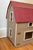 Beautiful large Colonial dollhouse with handmade furnishings, including beds, sofa and chairs, tables, and side tables,...