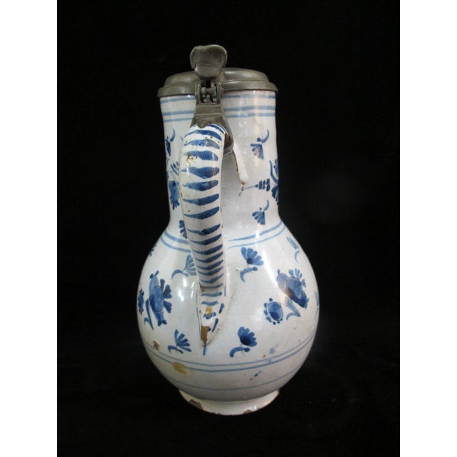 German 18th century pewter lidded tankard. Blue and white faience glazed pottery body having bulbous design with single...