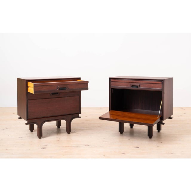 Elegant pair of Italian bedside cabinets manufactured by Bernini in the 1960s. The cabinets are distinguished by their...
