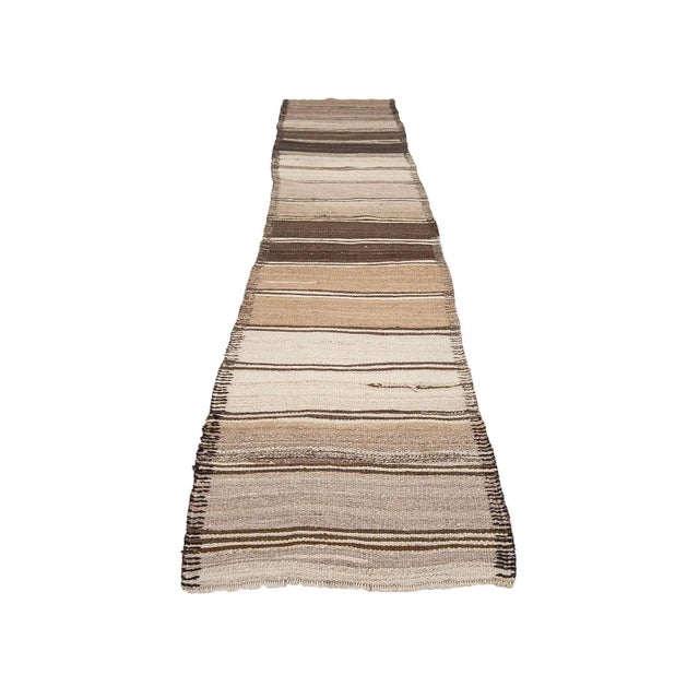 Vintage handwoven decorative kilim runner from Northern Iraq. Approximately 40-50 years old. In very good condition.